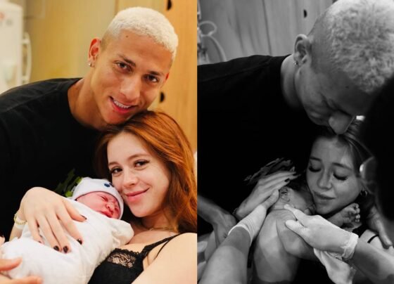 foto colorida de richarlison com mulher e bebe - metrópoles