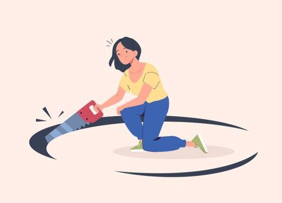 Ilustração mostra mulher cortando o chão ao seu redor, representando autossabotagem - Metrópoles